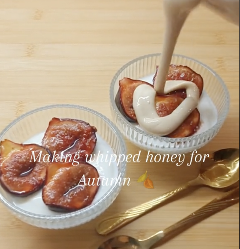 Pouring whipped honey over figs